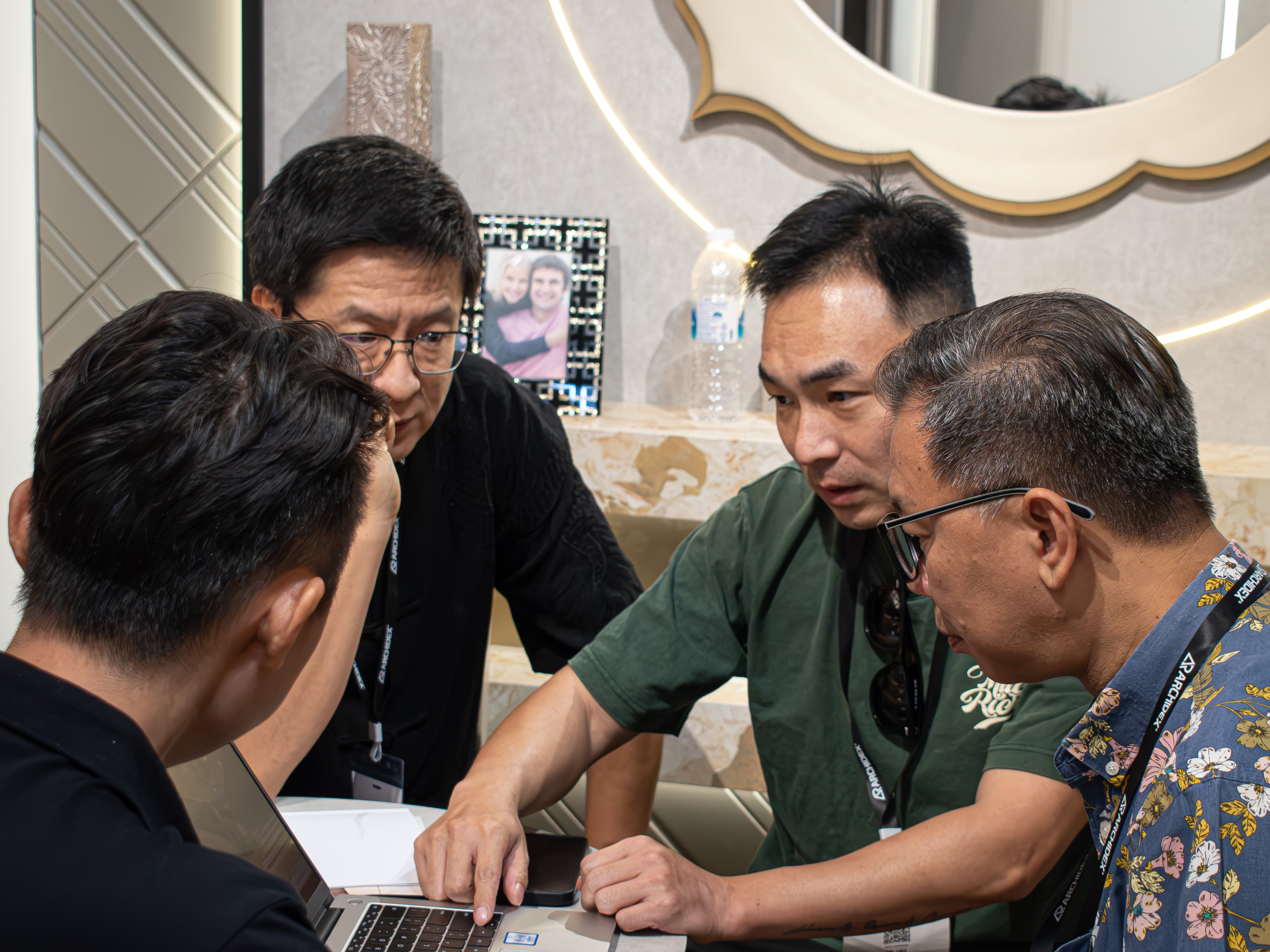 Design discussion with visitors at ARCHIDEX